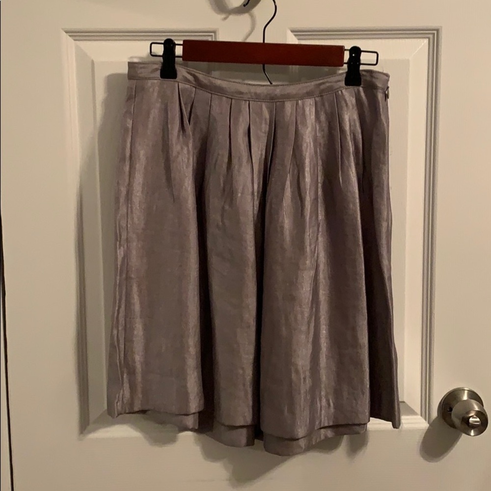 Metallic grey fabric.  bubble skirt.